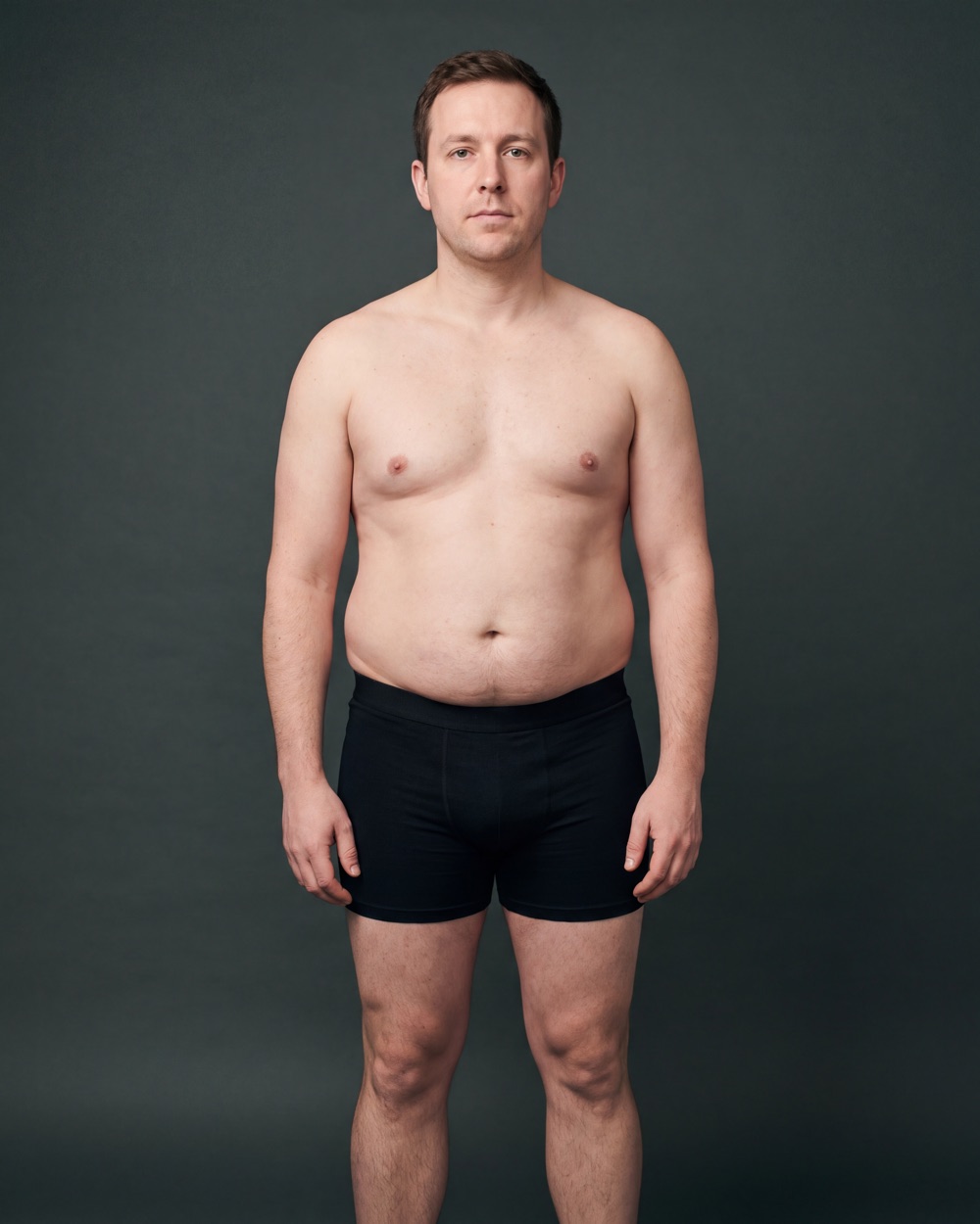 Illustration of an untrained man standing against a plain studio ground